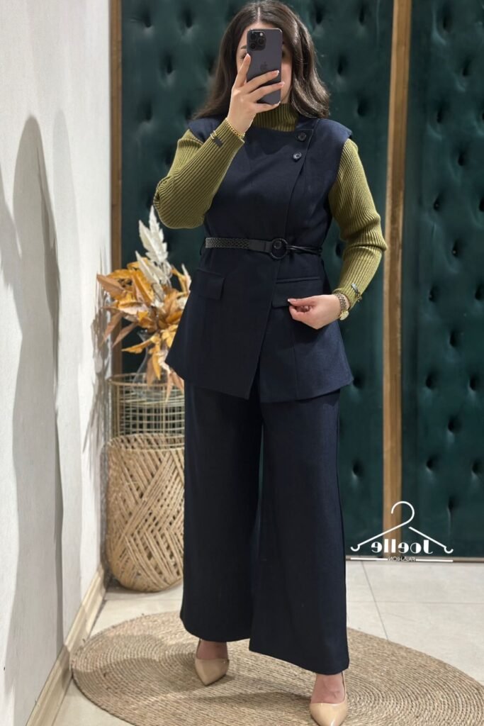 Navy Blue Sleeveless Wrap Vest + Olive Green Ribbed Turtleneck + Navy Wide-Leg Trousers + Nude Pointed Heels
