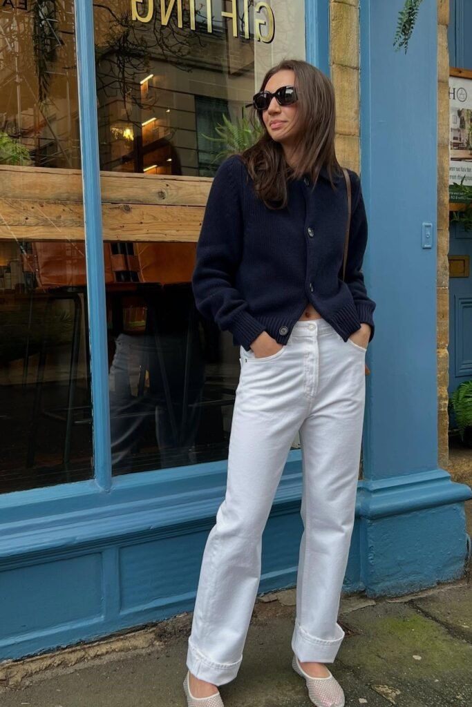 Navy Button-Up Cardigan + White Straight-Leg Jeans + White Mesh Flats