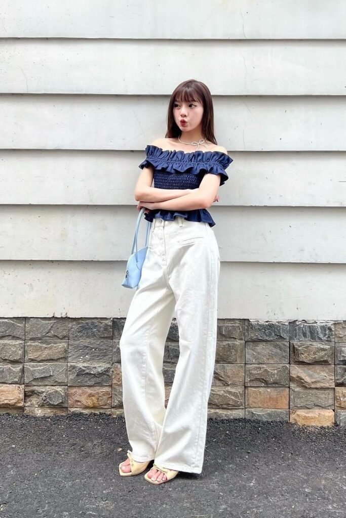 Navy Off-the-Shoulder Smocked Top + White Wide-Leg Trousers + Beige Sandals