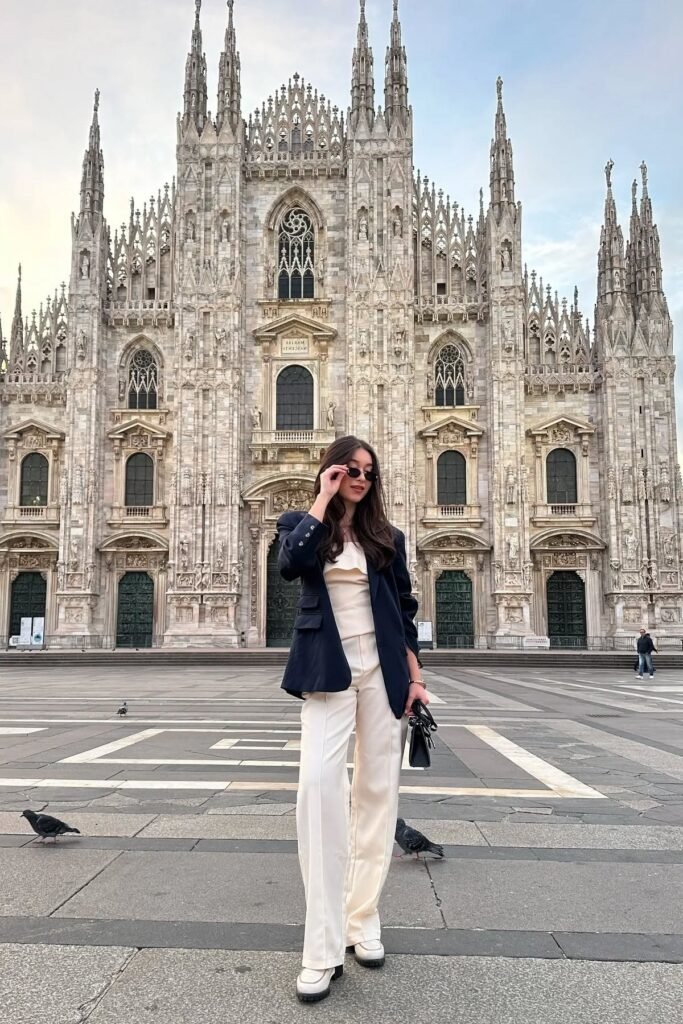 Navy Oversized Blazer + Cream Ruffled Top + Cream Wide Leg Trousers + White Loafers