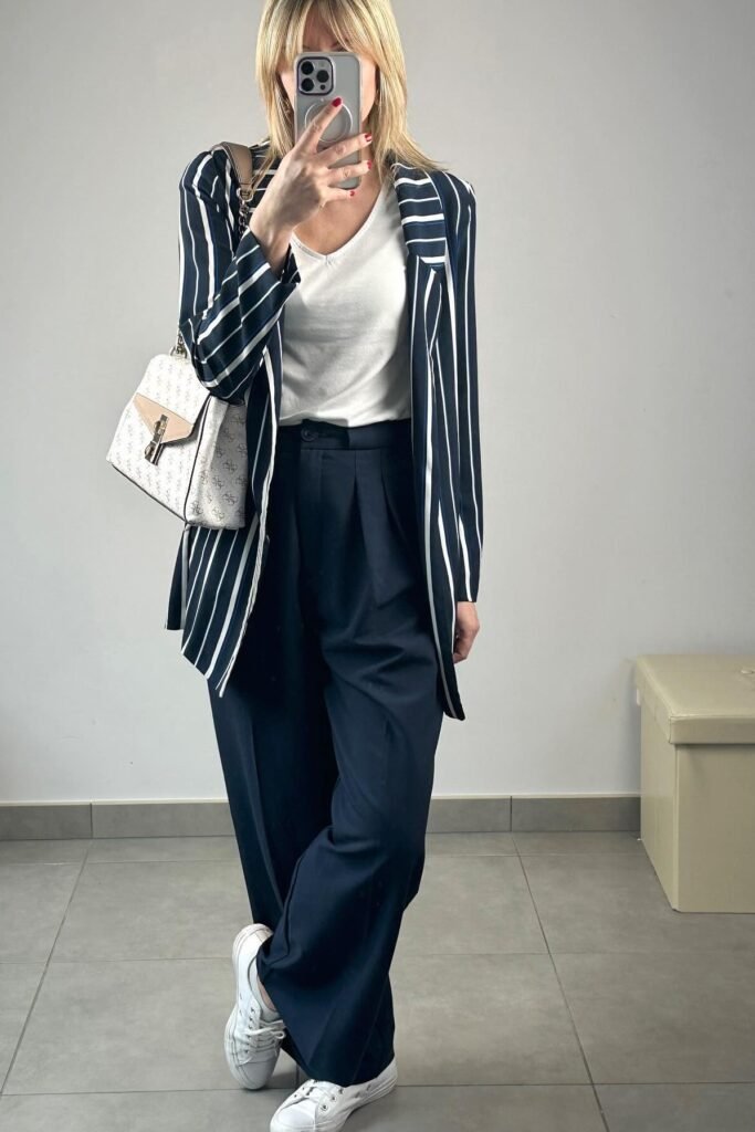 Navy and White Vertical Striped Blazer + Navy High-Waisted Wide-Leg Trousers + White Canvas Sneakers