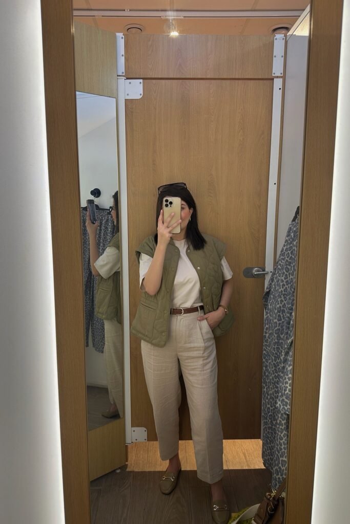 Olive Green Quilted Vest + Cream T-Shirt + Beige Linen Trousers + Olive Green Loafers