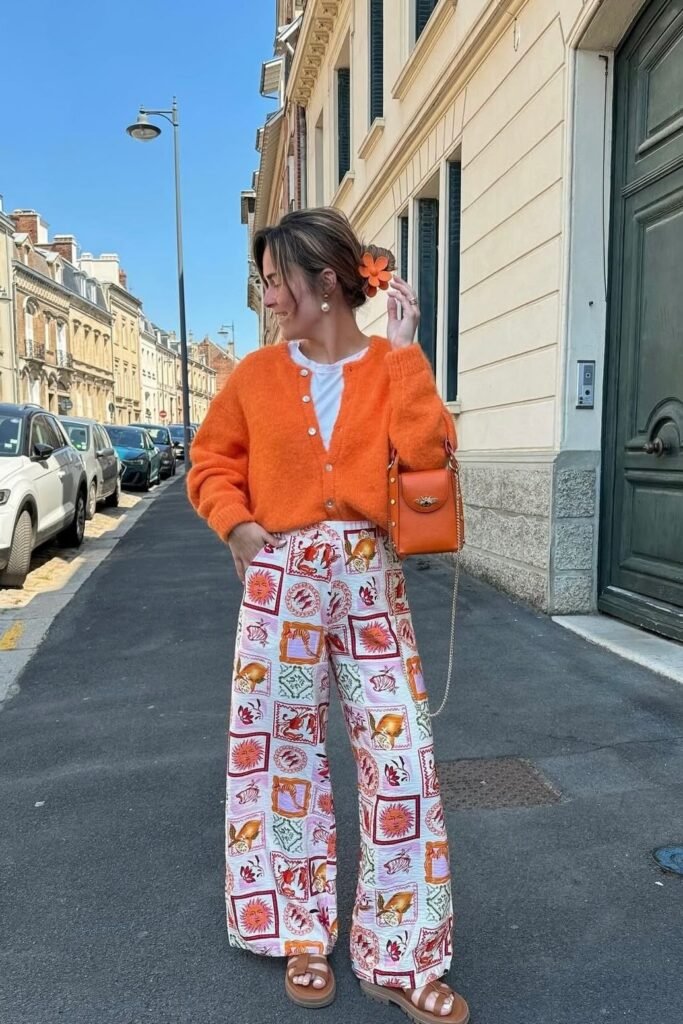 Orange Button-Up Cardigan + Patterned Wide-Leg Trousers + Brown Platform Sandals
