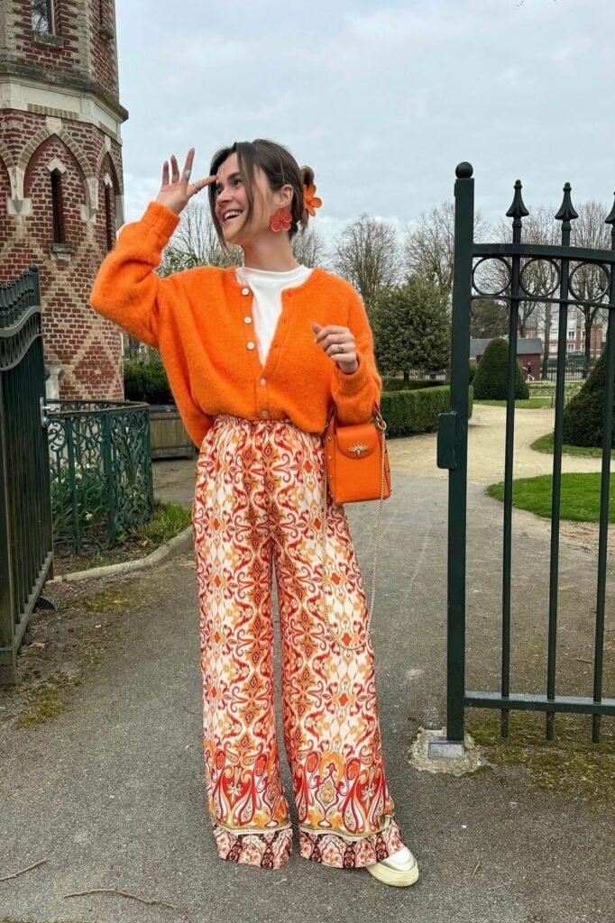 Orange Cardigan + White T-Shirt + Orange Abstract Print Wide-Leg Pants + White Sneakers
