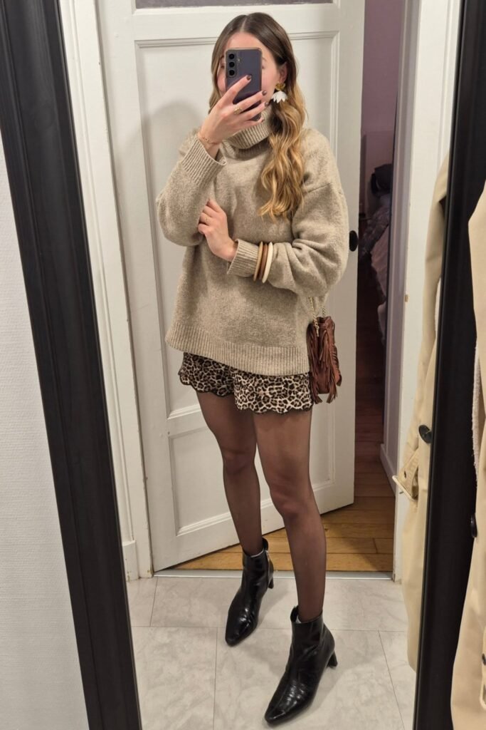 Oversized Beige Mock-Neck Sweater + Leopard Print Shorts + Black Pointed-Toe Ankle Boots