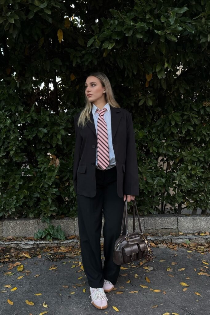 Oversized Black Blazer + White Button-Down Shirt + Pink Striped Tie + Black Wide-Leg Trousers + Pink Pearl-Detail Sneakers
