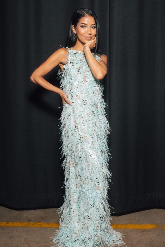 Pale Blue Sleeveless Feathered Gown + Crystal Eye Makeup + Black Hair