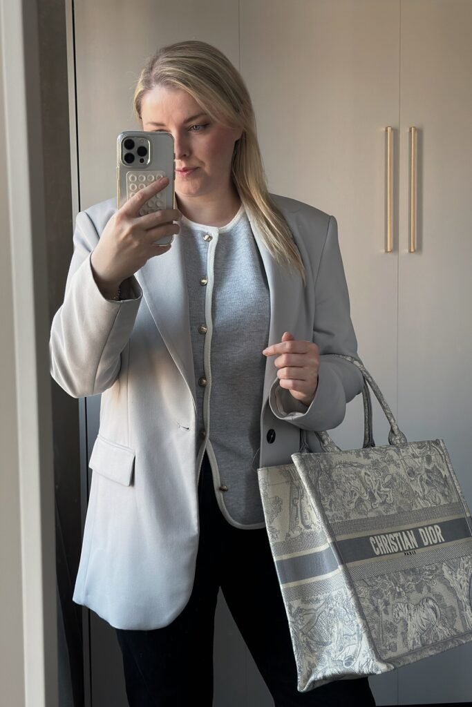 Pale Grey Blazer + Grey Contrast-Trim Cardigan + Black Trousers + Grey Patterned Tote Bag