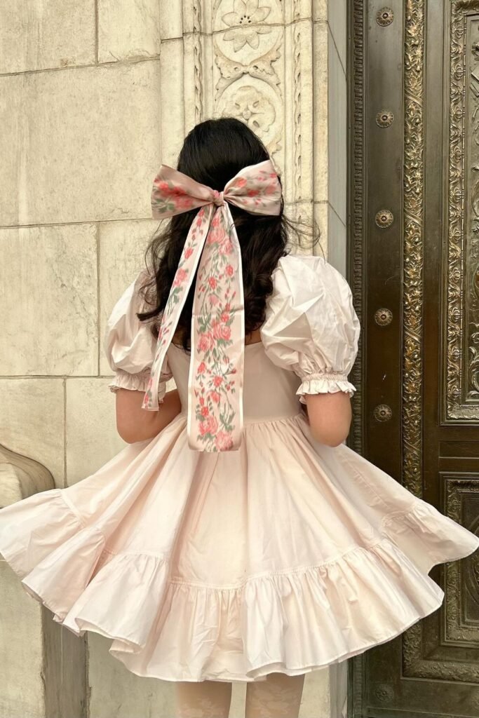 Pale Pink Ruffle Hem Dress + Large Floral Bow + Floral Patterned Tights