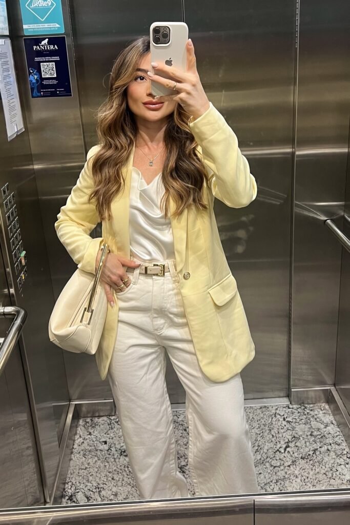 Pale Yellow Blazer + White Satin Cowl Neck Top + White Wide-Leg Jeans + Cream Top-Handle Bag