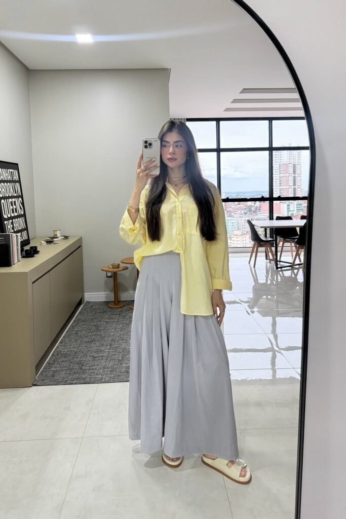 Pale Yellow Oversized Button-Down + Light Grey Pleated Wide-Leg Trousers + White Slides
