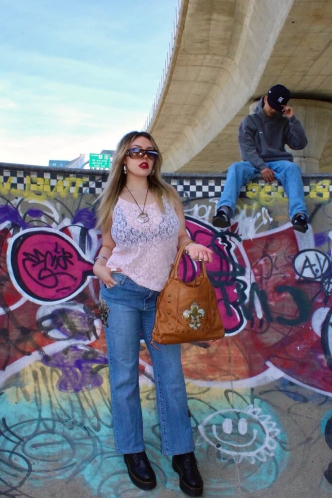 Pink Lace Camisole + Blue Wide-Leg Jeans + Black Platform Boots