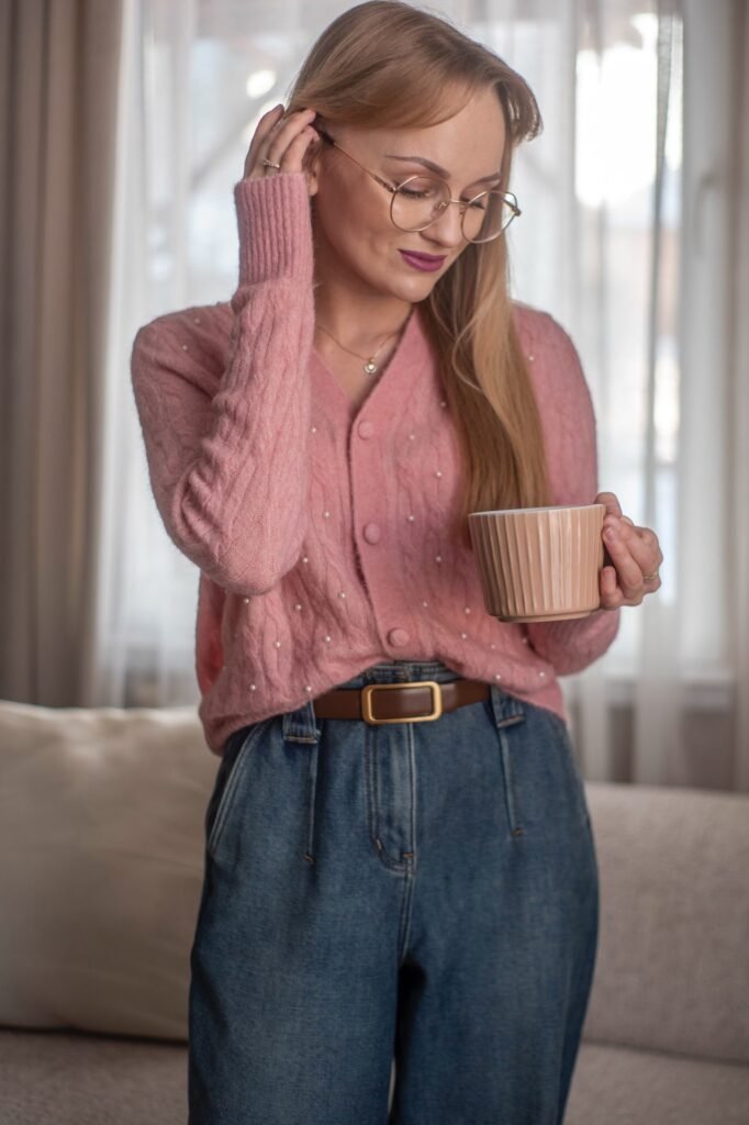Pink Pearl-Embellished Cable Knit Cardigan + Dark Wash Pleated Jeans + Brown Leather Belt
