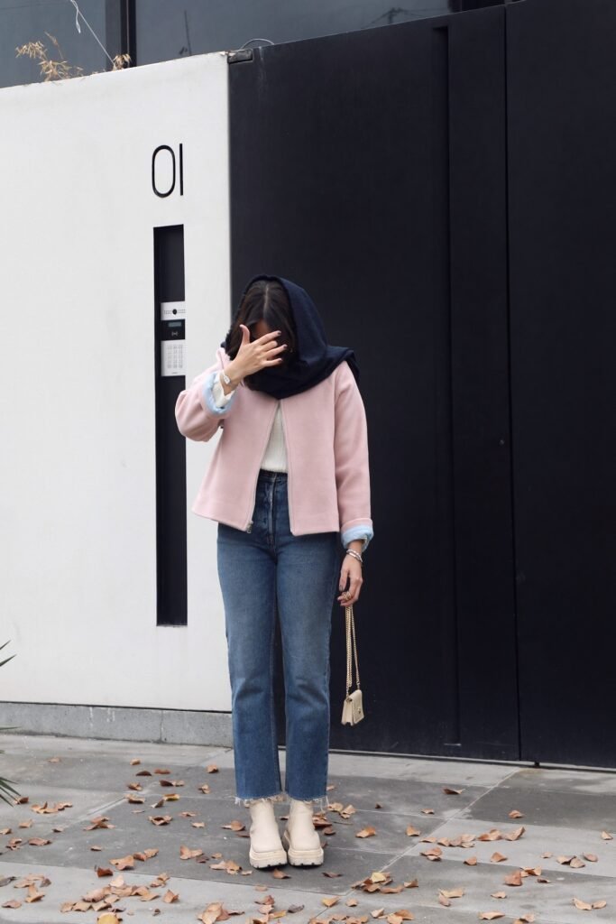 Pink Structured Jacket + White Knit Sweater + Straight-Leg Blue Jeans + Beige Platform Boots