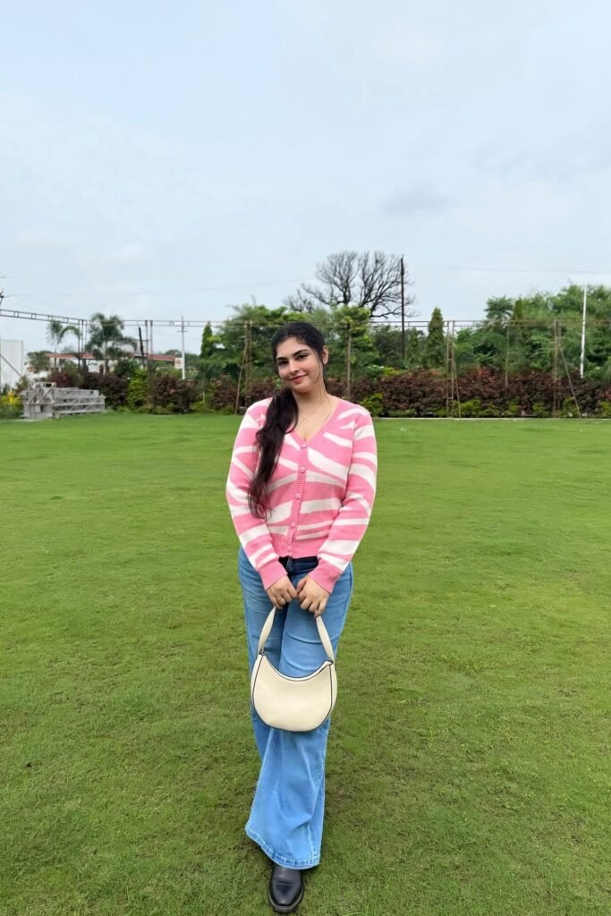 Pink and White Zebra Pattern Cardigan + Light Wash Wide Leg Jeans + Black Boots