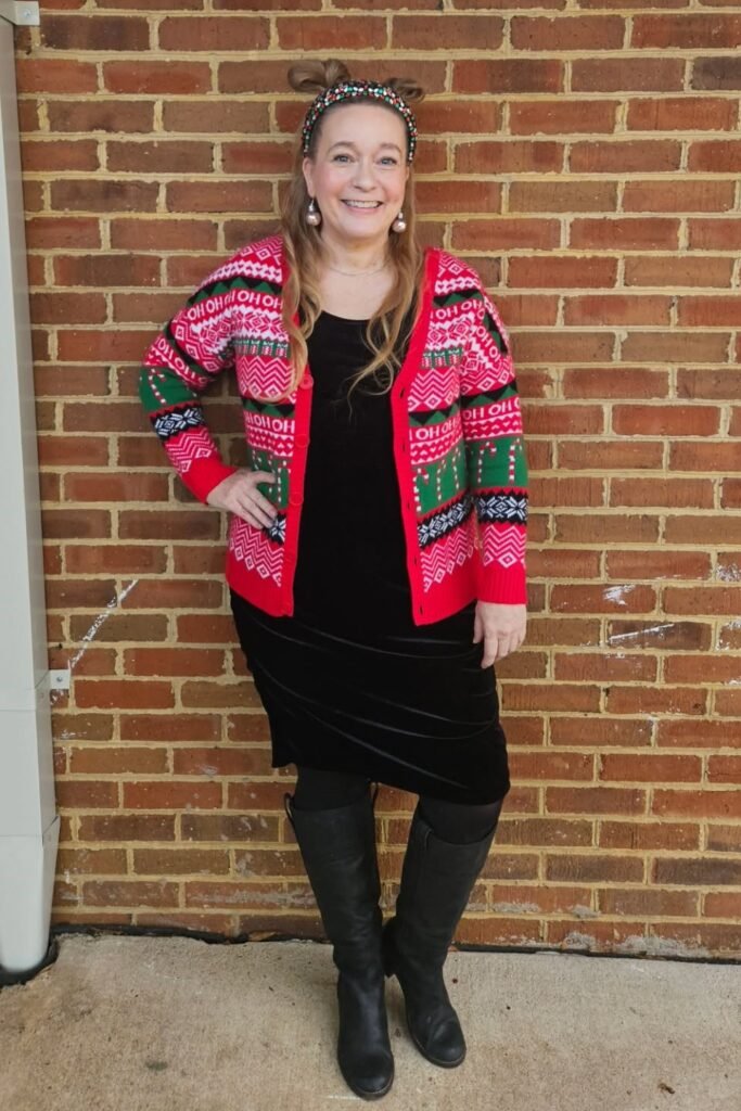 Red Holiday Cardigan + Black Velvet Knee-Length Dress + Black Knee-High Boots