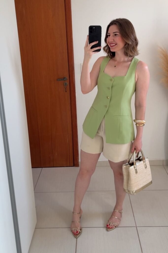 Sage Green Button-Up Long Vest + Cream Tailored Shorts + Gold Strappy Sandals + Straw Tote