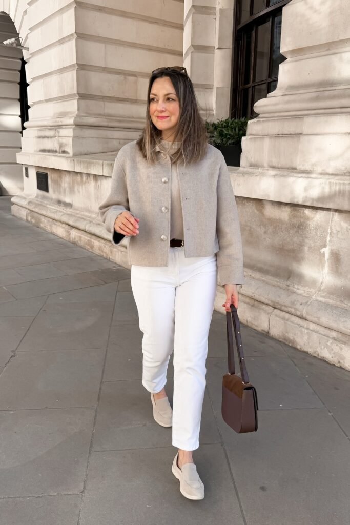 Beige Trench Coat + White Pleated Mini Dress + Cream Knee-High Boots