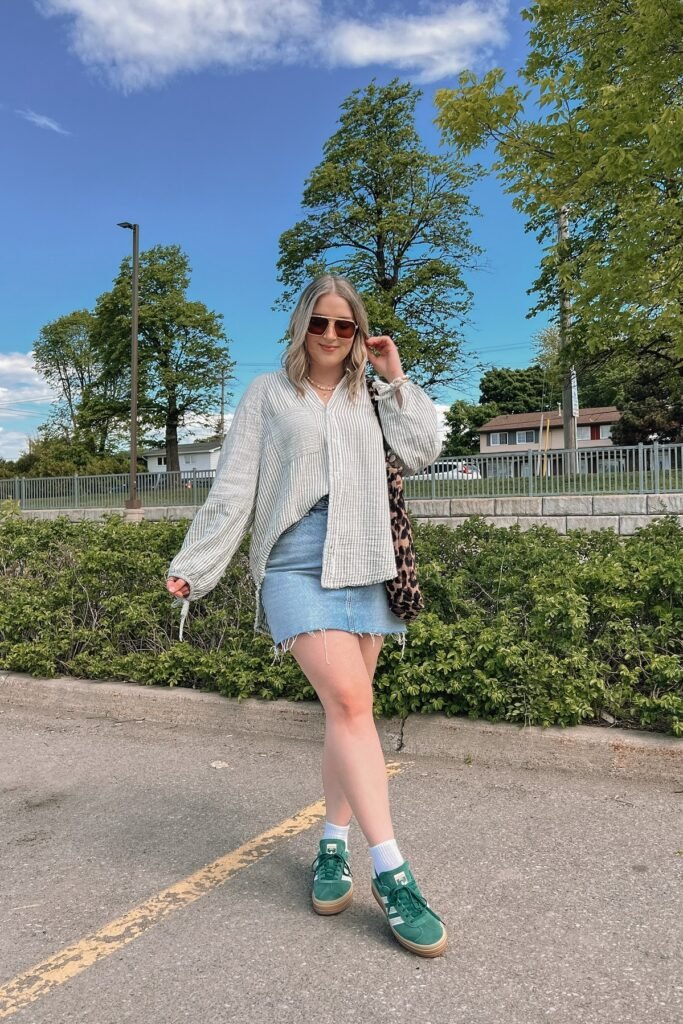 Striped Button Down Shirt + Denim Mini Skirt + Green Adidas Gazelle Sneakers