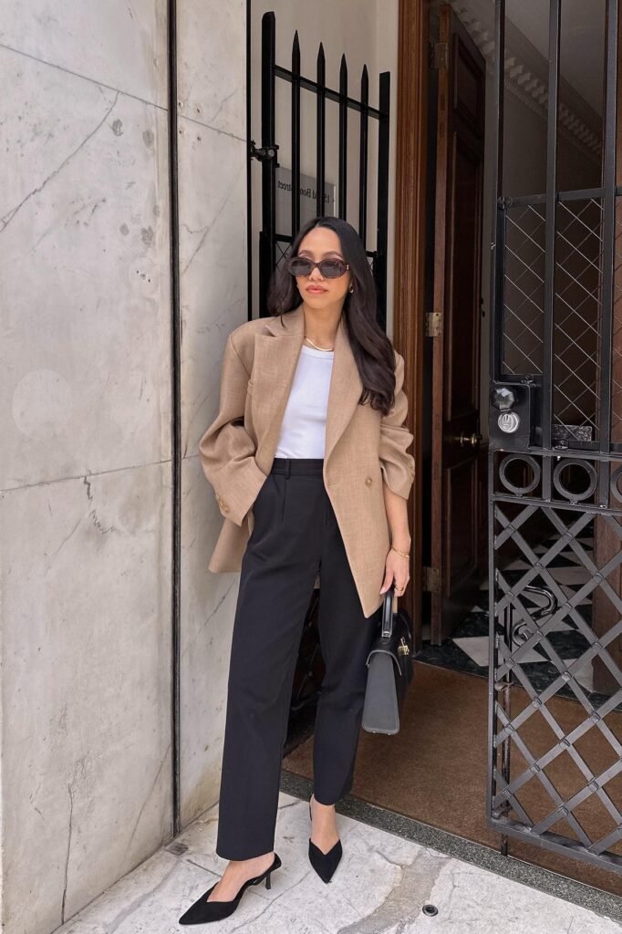 Tan Oversized Blazer + White Bodysuit + Black Pleated Trousers + Black Pointed Mule Heels