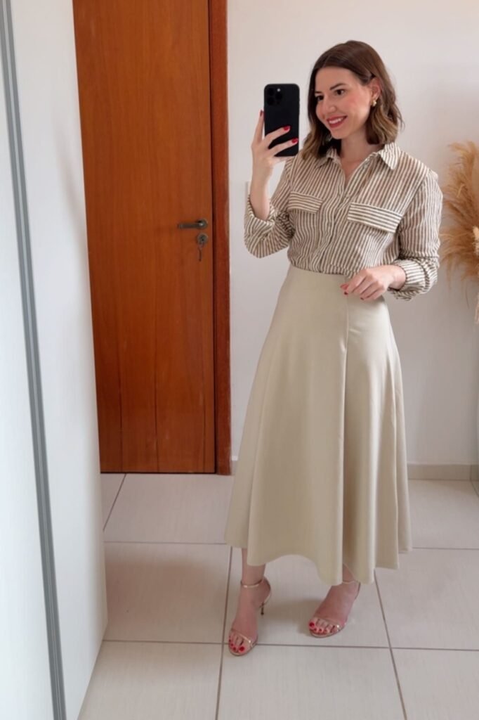 Tan Striped Button Down Shirt + Beige A Line Midi Skirt + Gold Strappy Heeled Sandals