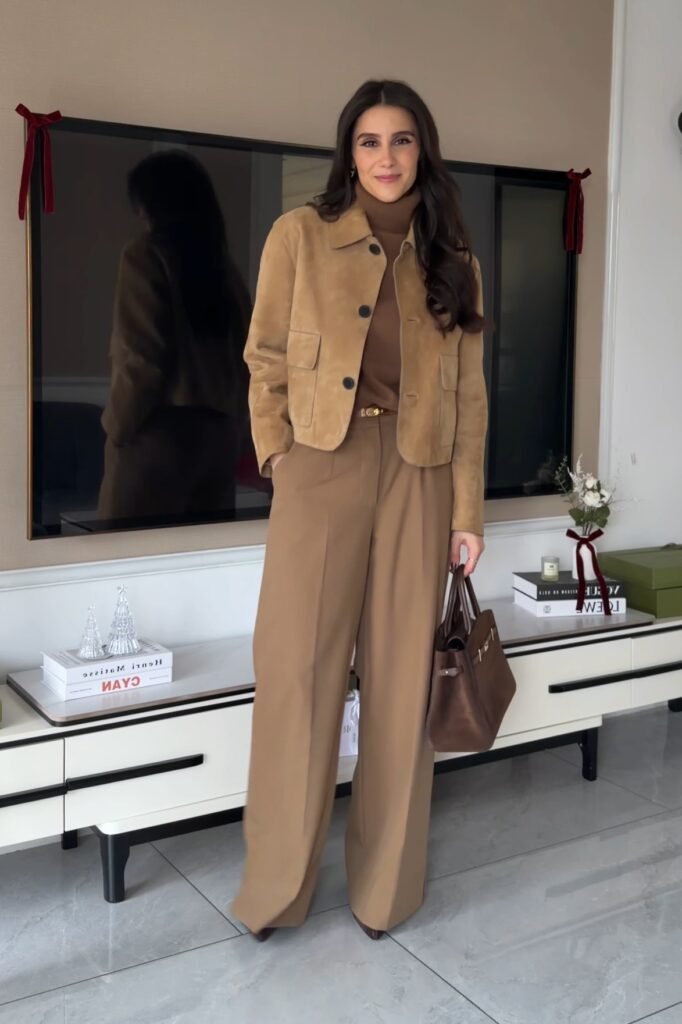 Tan Suede Jacket + Brown Turtleneck + Camel Wide-Leg Trousers + Brown Suede Tote