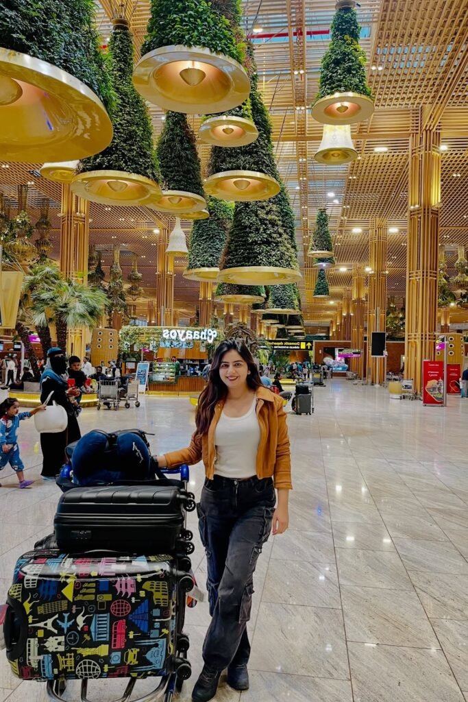 Tan Suede Jacket + White Tank Top + Black Cargo Pants + Black Boots