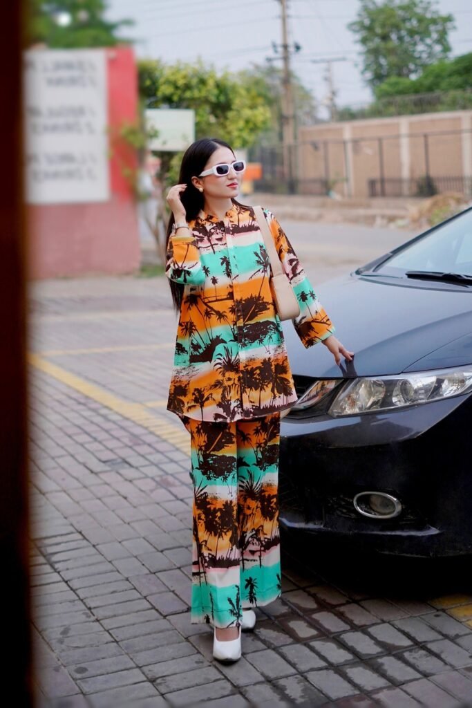 Vibrant Sunset Print Shirt + Matching Wide Leg Trousers + White Pointed Heels