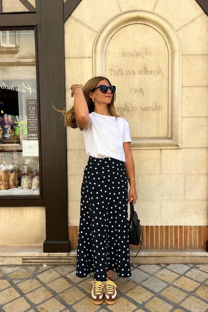 White Crewneck T-Shirt + Black Polka Dot Midi Skirt + Brown Contrast Sneakers
