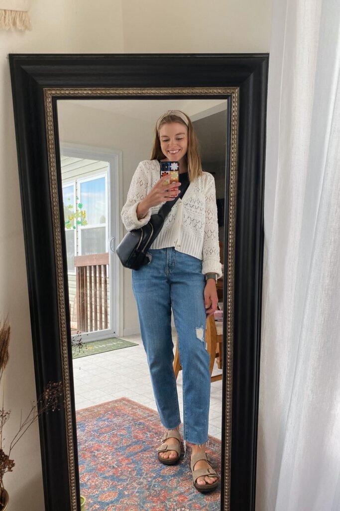 White Crochet Cardigan + Black Top + Blue Straight-Leg Jeans + Tan Suede Slides