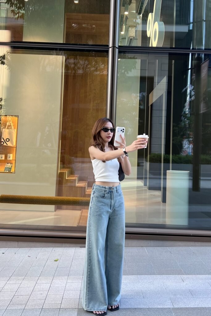 White Cropped Tank Top + Light Wash Wide Leg Jeans + Black Sandals