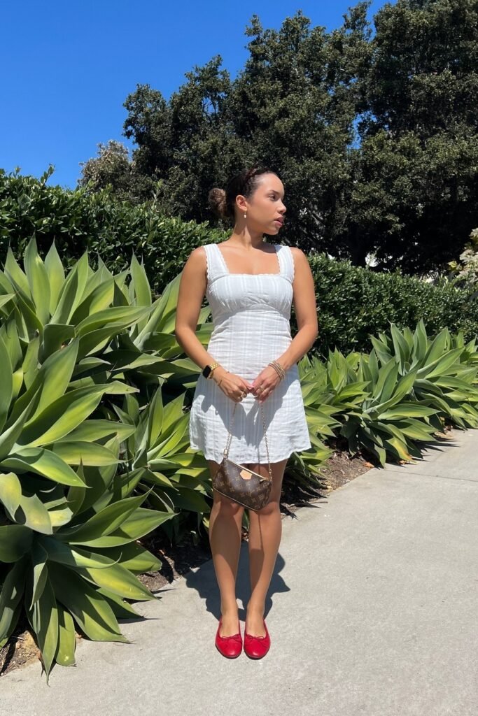 White Eyelet Mini Dress + Brown Monogram Bag + Red Ballet Flats
