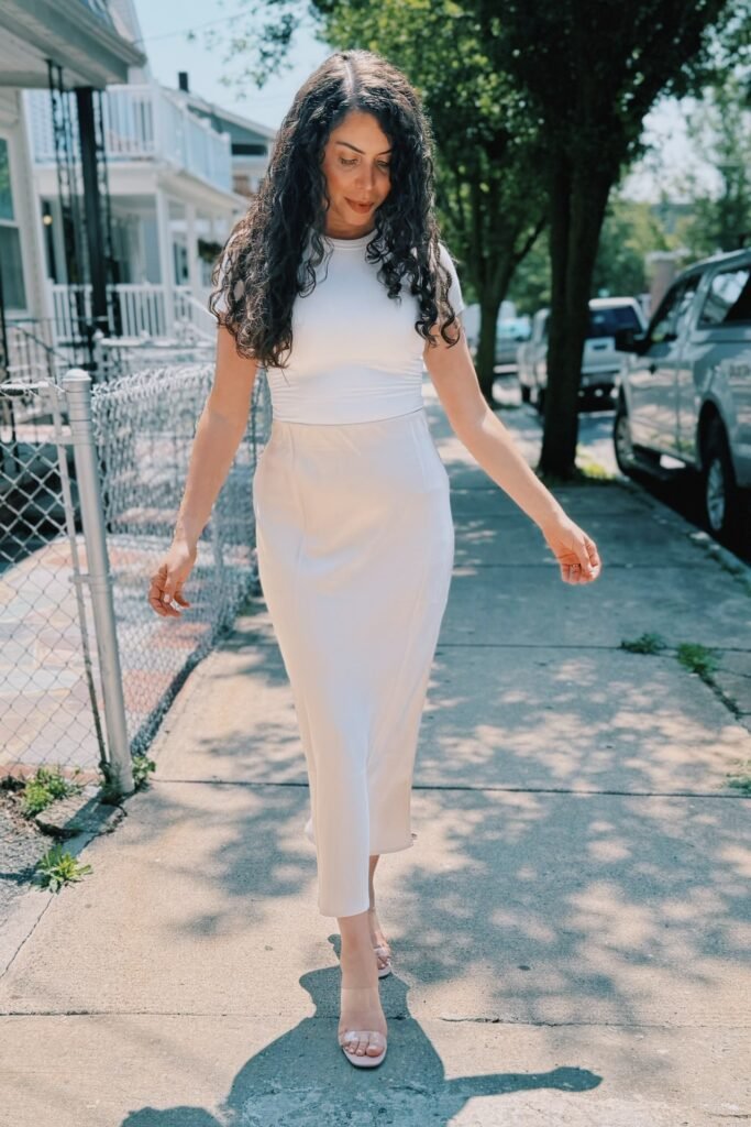 White Fitted Short-Sleeve Top + Cream Satin Midi Skirt + Clear Strappy Heels