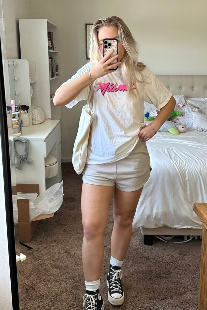 White Graphic T-Shirt + Light Grey Sweat Shorts + Black High-Top Sneakers