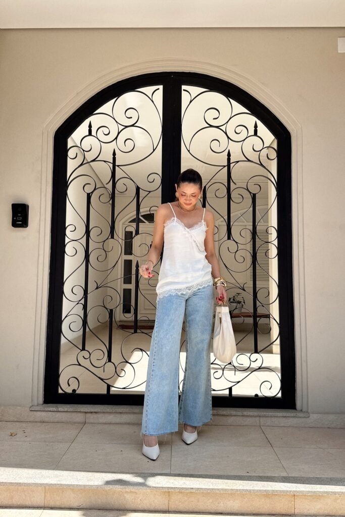 White Lace-Trim Camisole + Light Wash Wide-Leg Jeans + White Pointed-Toe Heels