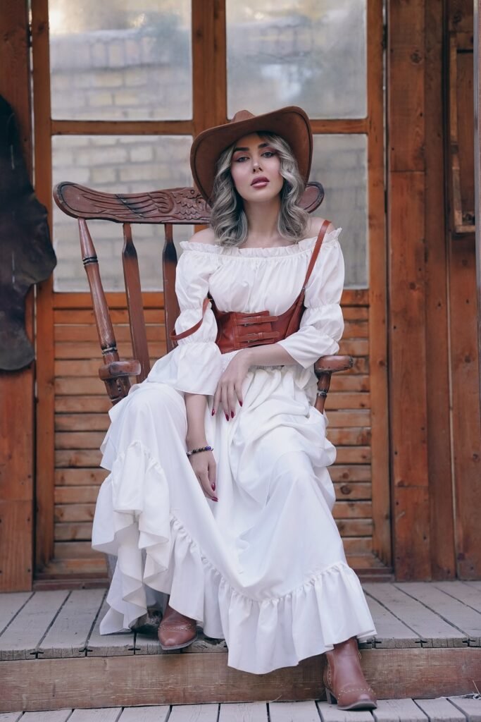 White Off-the-Shoulder Ruffle Maxi Dress + Brown Leather Corset Belt + Brown Ankle Boots