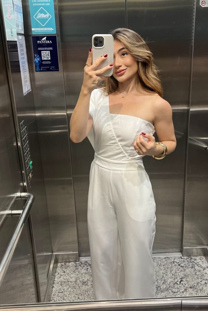 White One-Shoulder Jumpsuit + Gold Bangle + Red Nails