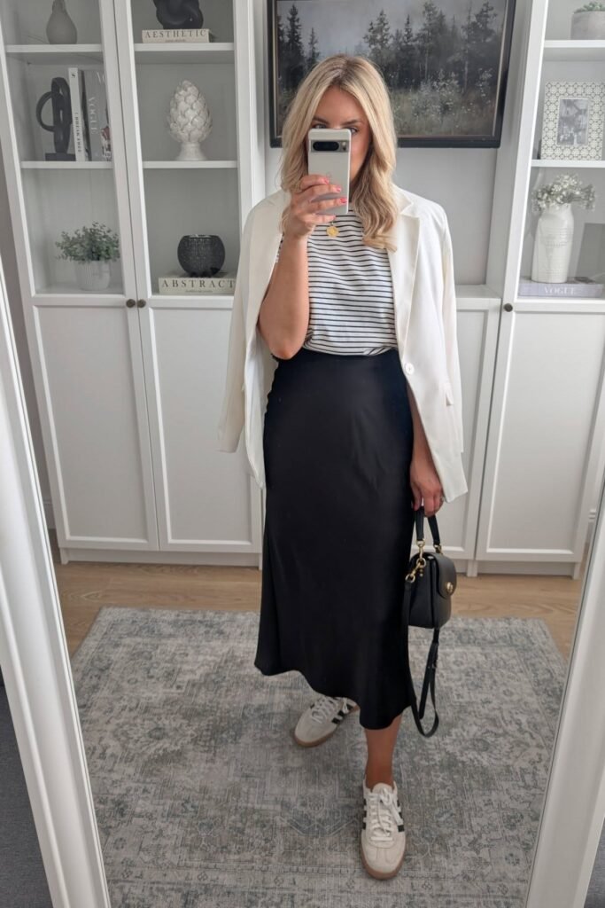 White Oversized Blazer + Striped T-Shirt + Black Satin Midi Skirt + White Sneakers