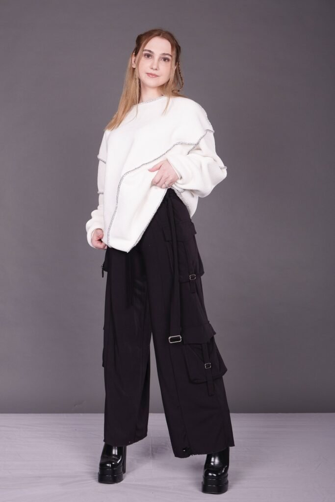 White Oversized Distressed Sweater + Black Strap Cargo Pants + Black Platform Boots