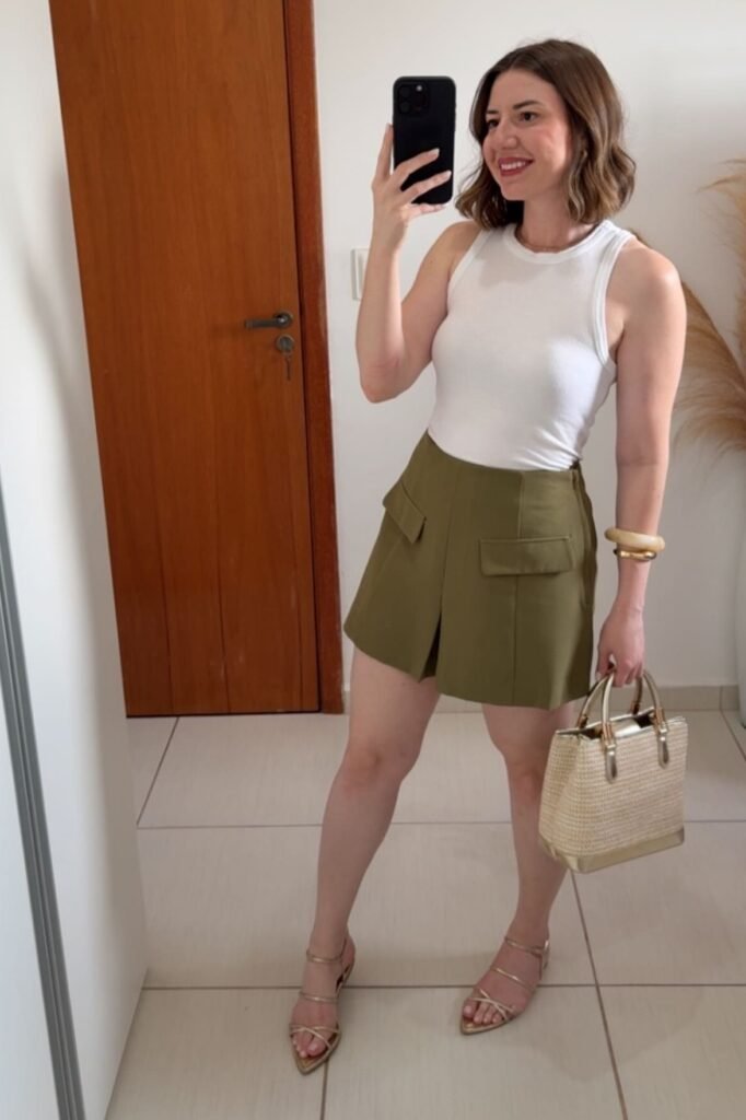White Ribbed Tank Top + Olive Green High-Waisted Tailored Shorts + Gold Strappy Sandals + Straw Tote