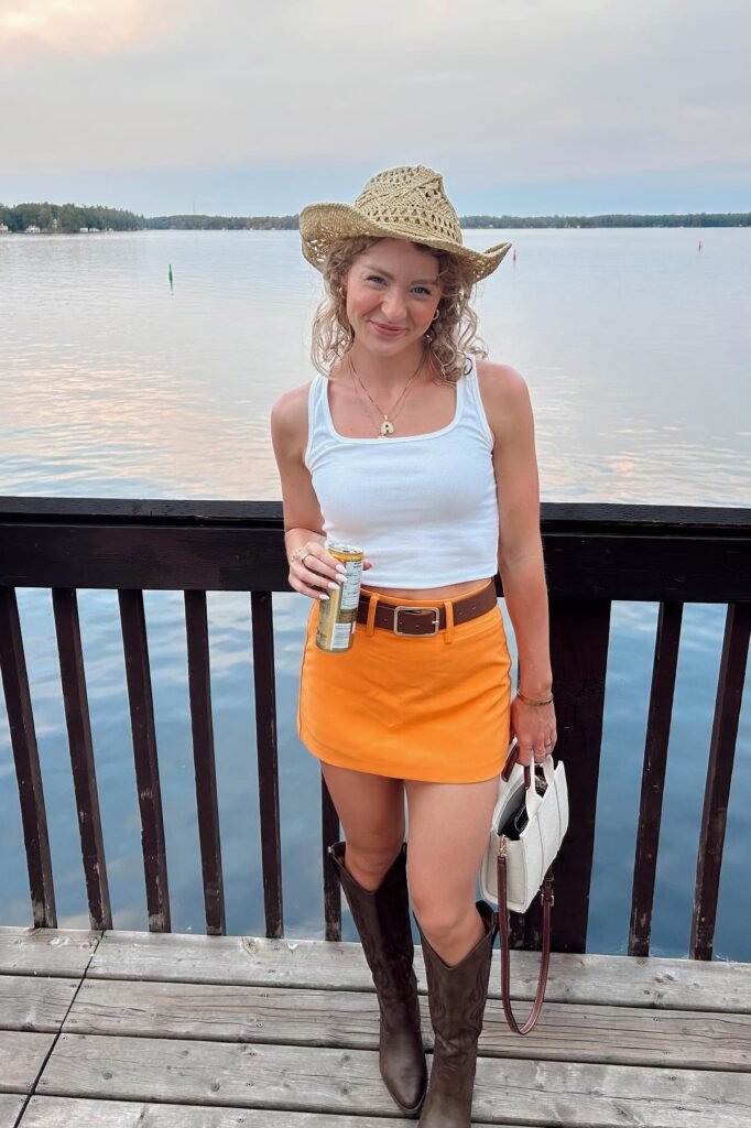White Ribbed Tank Top + Orange Mini Skirt + Dark Brown Western Boots