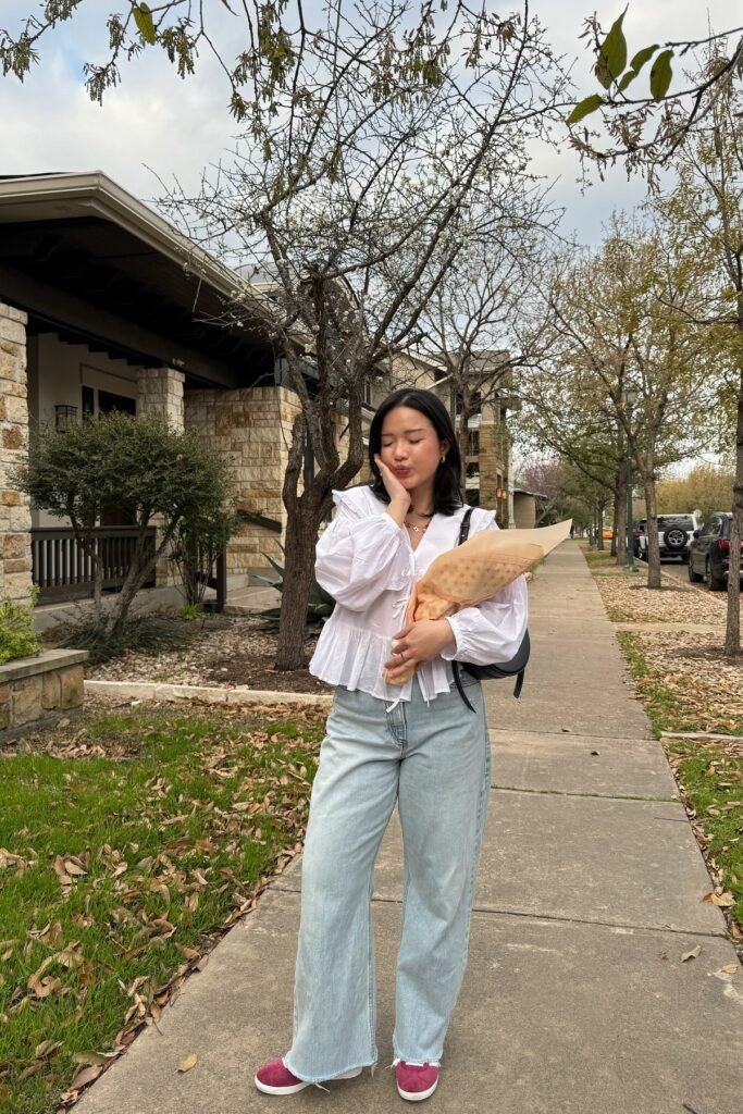 White Ruffle Blouse + Light Wash Wide Leg Jeans + Magenta Sneakers