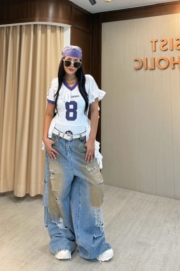 White Ruffled Sports Jersey + Distressed Baggy Jeans + White Chunky Sneakers