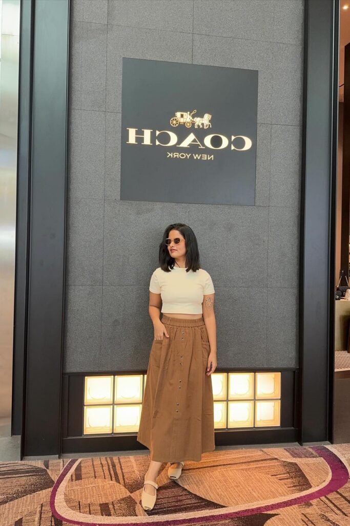 White Short-Sleeve Crop Top + Brown Button-Down Midi Skirt + Beige Mary Jane Flats