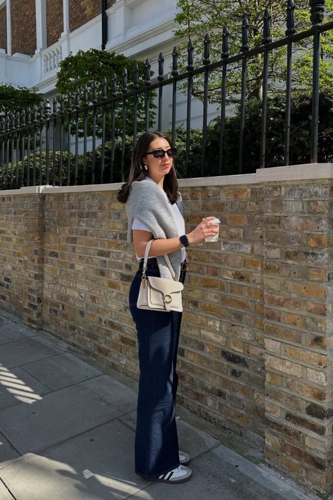 White T-Shirt + Dark Wash Flared Jeans + Adidas Samba Sneakers