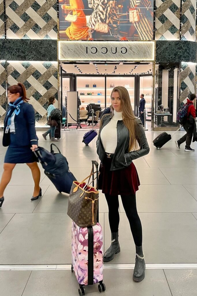 White Turtleneck + Black Leather Jacket + Burgundy Velvet Skater Skirt + Black Lug Sole Boots