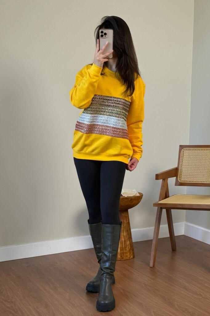 Yellow Crewneck Sweatshirt with Metallic Stripes + Black Leggings + Tall Black Boots
