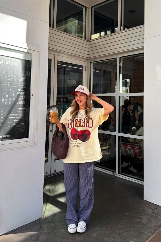Yellow Graphic T Shirt + Blue Patterned Wide Leg Pants + White High Top Sneakers