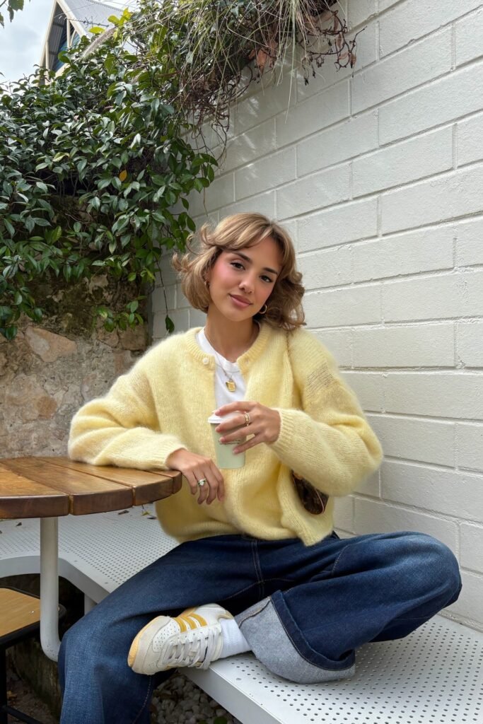 Yellow Mohair Cardigan + White T-Shirt + Dark Wash Wide-Leg Jeans + Yellow and White Sneakers