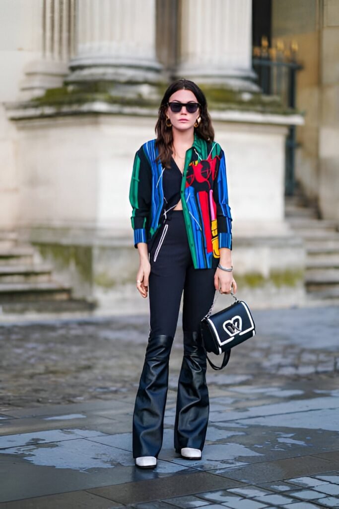 Abstract Colorful Patterned Shirt + Black Flared Leather Trousers + Black & White Handbag